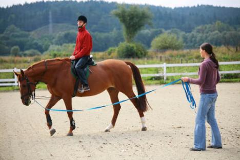 a man riding a horse